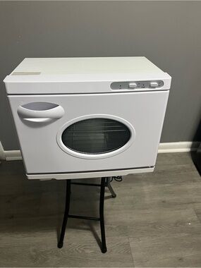 Compact white UV Towel Warmer and Sanitizer